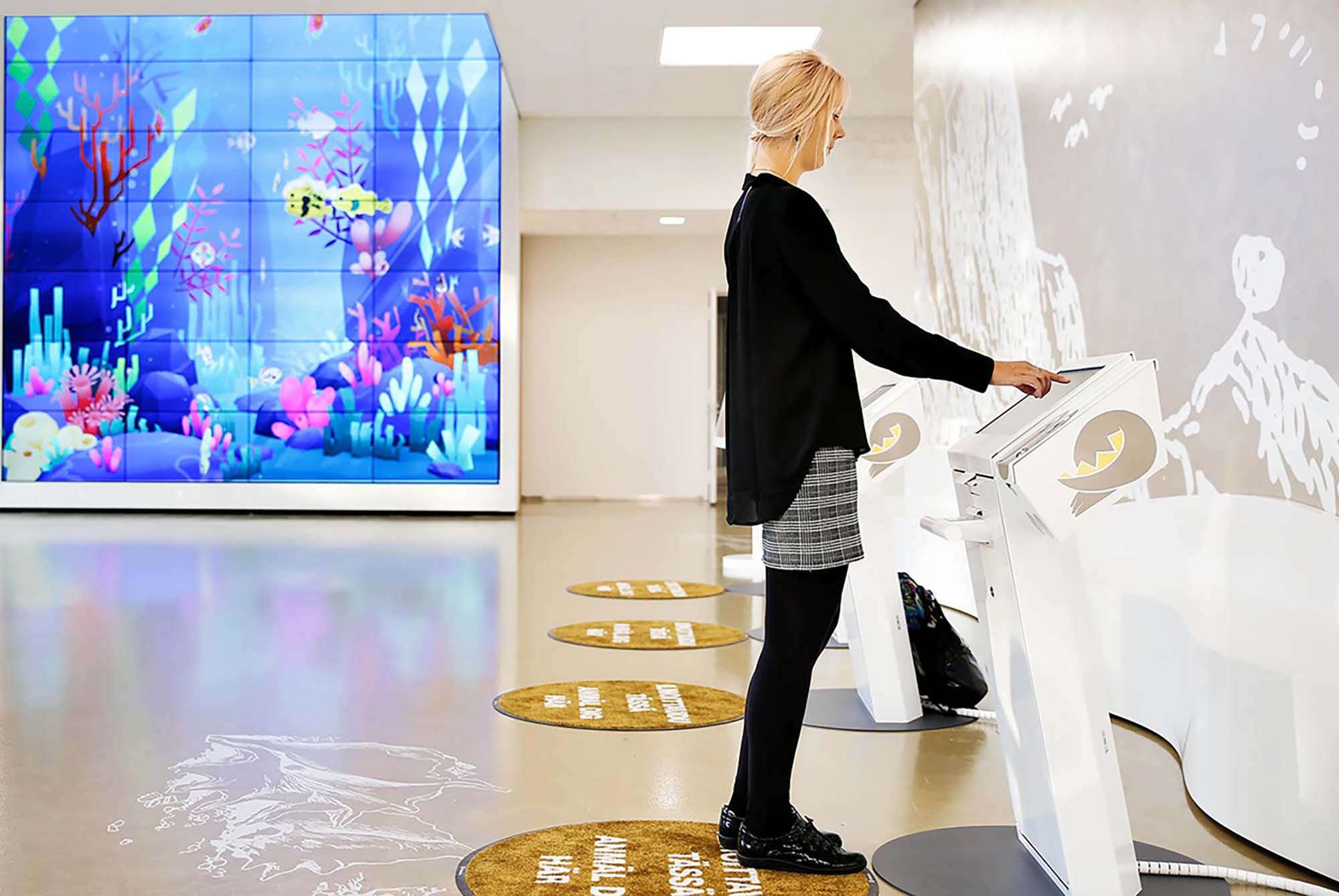 Patient checking in at a self-service kiosk